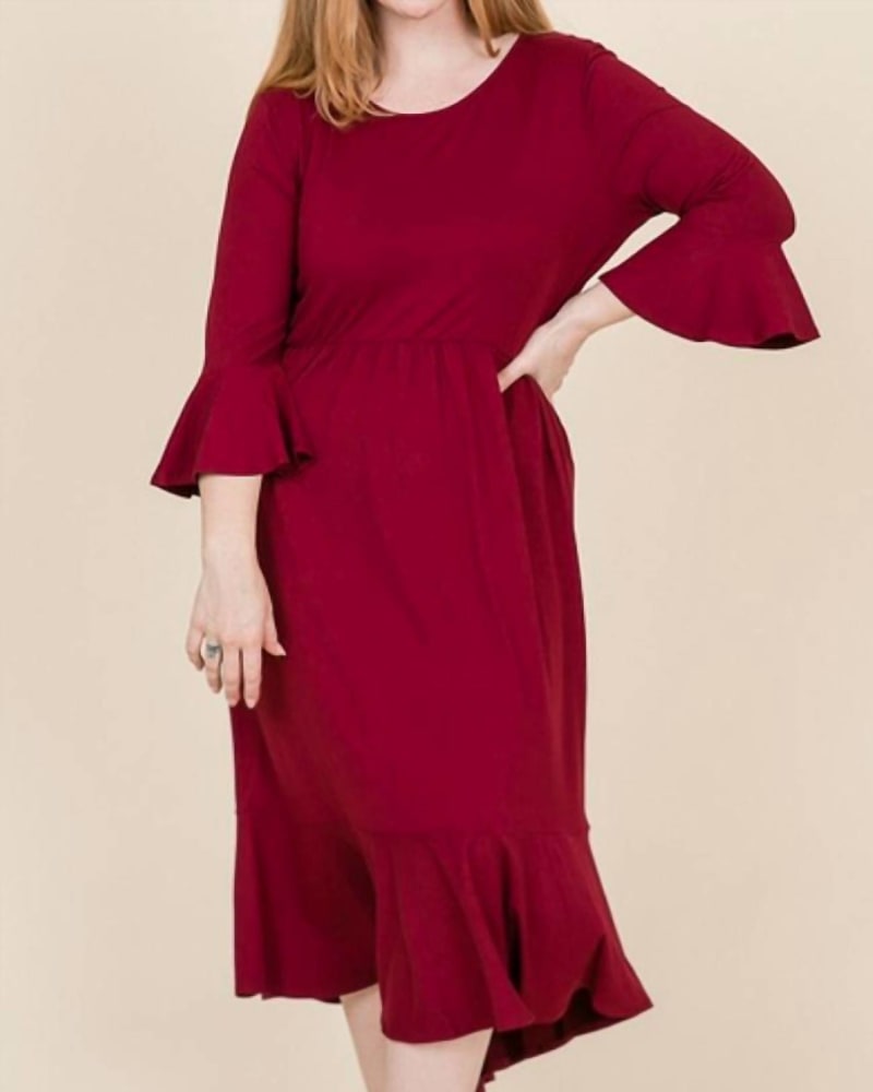 Front of a model wearing a size 2X Cropped Bell Sleeve Midi Dress in Burgundy in Burgundy by Reborn J. | dia_product_style_image_id:337243